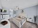 Serene main bedroom featuring a ceiling fan and neutral decor at 5304 Nicklaus Dr, Winter Haven, FL 33884