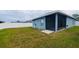 The home features a large backyard with a screened patio and privacy fence at 663 Lucerne Blvd, Winter Haven, FL 33881