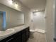 Clean bathroom with a shower, and a single sink vanity at 663 Lucerne Blvd, Winter Haven, FL 33881