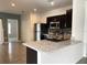 Beautiful kitchen with stainless steel appliances, granite countertops, and eat-in bar at 663 Lucerne Blvd, Winter Haven, FL 33881