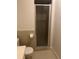 Bathroom with a tiled shower and toilet at 683 Broadmoor Cir # 683, Winter Haven, FL 33884