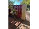 The patio is paved with red bricks, fenced in, and has some shrubbery at 683 Broadmoor Cir # 683, Winter Haven, FL 33884