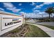 Welcome to Estates at Lake Hammock! Gorgeous community entrance at 708 Simone Ct, Haines City, FL 33844