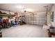 Spacious garage featuring an automatic door opener and plenty of room for parking and storage at 708 Simone Ct, Haines City, FL 33844