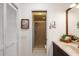 Bathroom featuring a vanity and a glass-enclosed shower stall, offering a clean and functional space at 762 Canberra Rd, Winter Haven, FL 33884