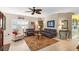 Inviting living room featuring neutral walls, a ceiling fan, and tile flooring at 762 Canberra Rd, Winter Haven, FL 33884