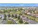 Aerial view of the neighborhood showcasing nearby apartments and condo complexes at 7759 Basnett Cir, Kissimmee, FL 34747
