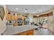 Bright kitchen with stainless appliances, breakfast nook, and sliding doors to patio at 7759 Basnett Cir, Kissimmee, FL 34747