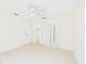 Bright bedroom featuring neutral walls, tiled floor, ceiling fan, and closet doors at 91 W Cedarwood Cir, Kissimmee, FL 34743
