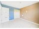 Empty bedroom showing tiled floors and a closet space at 91 W Cedarwood Cir, Kissimmee, FL 34743