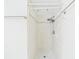 Shower featuring tiled walls, a shower head, and a soap dish at 91 W Cedarwood Cir, Kissimmee, FL 34743