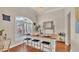 Charming dining area with a wooden island and natural light at 9502 Waterford Oaks Blvd, Winter Haven, FL 33884