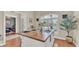 Charming dining area with a wooden island and natural light at 9502 Waterford Oaks Blvd, Winter Haven, FL 33884