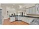 Spacious kitchen with ample counter space, stylish cabinetry, and stainless steel dishwasher at 9502 Waterford Oaks Blvd, Winter Haven, FL 33884