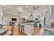 Open concept living room featuring an eat in kitchen and spacious living area at 9502 Waterford Oaks Blvd, Winter Haven, FL 33884