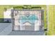 Aerial view of the private screened-in pool and patio area at 9502 Waterford Oaks Blvd, Winter Haven, FL 33884