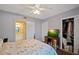 Comfortable bedroom featuring neutral walls, closet, and an ensuite bathroom at 1104 Country Club Dr # A-4, Lake Wales, FL 33898