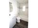 Updated bathroom with a shower-tub combo, vanity, and neutral finishes at 1328 3Rd Ne St, Winter Haven, FL 33881