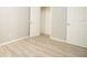 This bedroom features neutral walls and a closet for storage at 1328 3Rd Ne St, Winter Haven, FL 33881