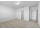 Bedroom with carpet and a view of the ensuite at 1340 Oak Valley Drive, Auburndale, FL 33823