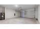 Spacious garage with a modern garage door at 1340 Oak Valley Drive, Auburndale, FL 33823