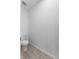 Clean and simple powder room featuring tile floors at 1340 Oak Valley Drive, Auburndale, FL 33823