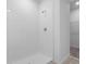 Tiled shower with glass door, and chrome fixtures at 1340 Oak Valley Drive, Auburndale, FL 33823