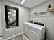 Laundry room featuring a modern washer and dryer at 1397 Axel Cir, Winter Haven, FL 33880