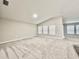 Bright, open living space with neutral walls, plush carpeting, and multiple windows for natural light at 1397 Axel Cir, Winter Haven, FL 33880
