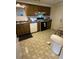 Functional kitchen with ample counter space and plenty of room for cooking and storage at 1411 Grand Cayman Cir, Winter Haven, FL 33884