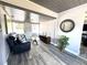 Bright sitting room featuring a comfortable couch and stylish decor at 1442 Gilmore Ave, Lakeland, FL 33805