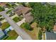 Overhead view of the home showing a well-maintained lawn, and inviting front entrance at 1447 Kingfish Ln, Winter Haven, FL 33884