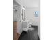 Modern bathroom with marble tile, stylish vanity, and sleek lighting at 1530 S Lake Howard Dr, Winter Haven, FL 33880