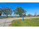 Street view with a clear shot of a mailbox and glimpses of the waterfront beyond at 1530 S Lake Howard Dr, Winter Haven, FL 33880