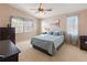 Comfortable bedroom with great natural light and an overhead fan at 1822 Nicaragua Way, Winter Haven, FL 33881