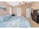 Bright and airy bedroom with great natural light and an overhead fan at 1822 Nicaragua Way, Winter Haven, FL 33881