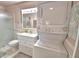 Bathroom featuring a stacked washer and dryer with shower and modern vanity at 200 El Camino Dr # 206, Winter Haven, FL 33884