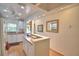 Well-lit kitchen with a ceiling fan and recessed lighting, offering ample counter space and modern appliances at 200 El Camino Dr # 206, Winter Haven, FL 33884