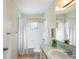 Inviting bathroom features a shower-tub combo with a plant at 205 Kilmer Ln, Winter Haven, FL 33884