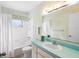 Inviting bathroom features a shower-tub combo with a plant at 205 Kilmer Ln, Winter Haven, FL 33884