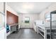 Functional laundry room space equipped with appliances and natural light at 205 Kilmer Ln, Winter Haven, FL 33884