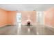 Inviting living room featuring terrazzo flooring and neutral paint at 205 Kilmer Ln, Winter Haven, FL 33884