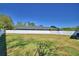 A large, fenced backyard provides ample space for outdoor enjoyment and recreation at 2110 Saddlewood Dr, Bartow, FL 33830