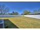 This fenced backyard provides ample outdoor space, perfect for entertainment and leisure at 2110 Saddlewood Dr, Bartow, FL 33830