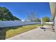 Spacious, fenced backyard with a patio, perfect for outdoor activities and relaxation at 2110 Saddlewood Dr, Bartow, FL 33830