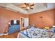 Spacious bedroom featuring trey ceilings, ceiling fan, and laminate flooring at 2110 Saddlewood Dr, Bartow, FL 33830