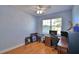 Bright bedroom with ample natural light and wood floors at 2110 Saddlewood Dr, Bartow, FL 33830