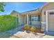 Charming front porch with stone accents, walkway, and a cozy seating area at 2110 Saddlewood Dr, Bartow, FL 33830