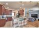 Spacious kitchen featuring wooden cabinets, countertops, and stainless steel appliances at 2110 Saddlewood Dr, Bartow, FL 33830