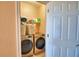 Laundry room with modern washer and dryer at 2110 Saddlewood Dr, Bartow, FL 33830